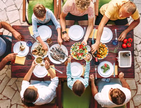 a family sitting down for a meal